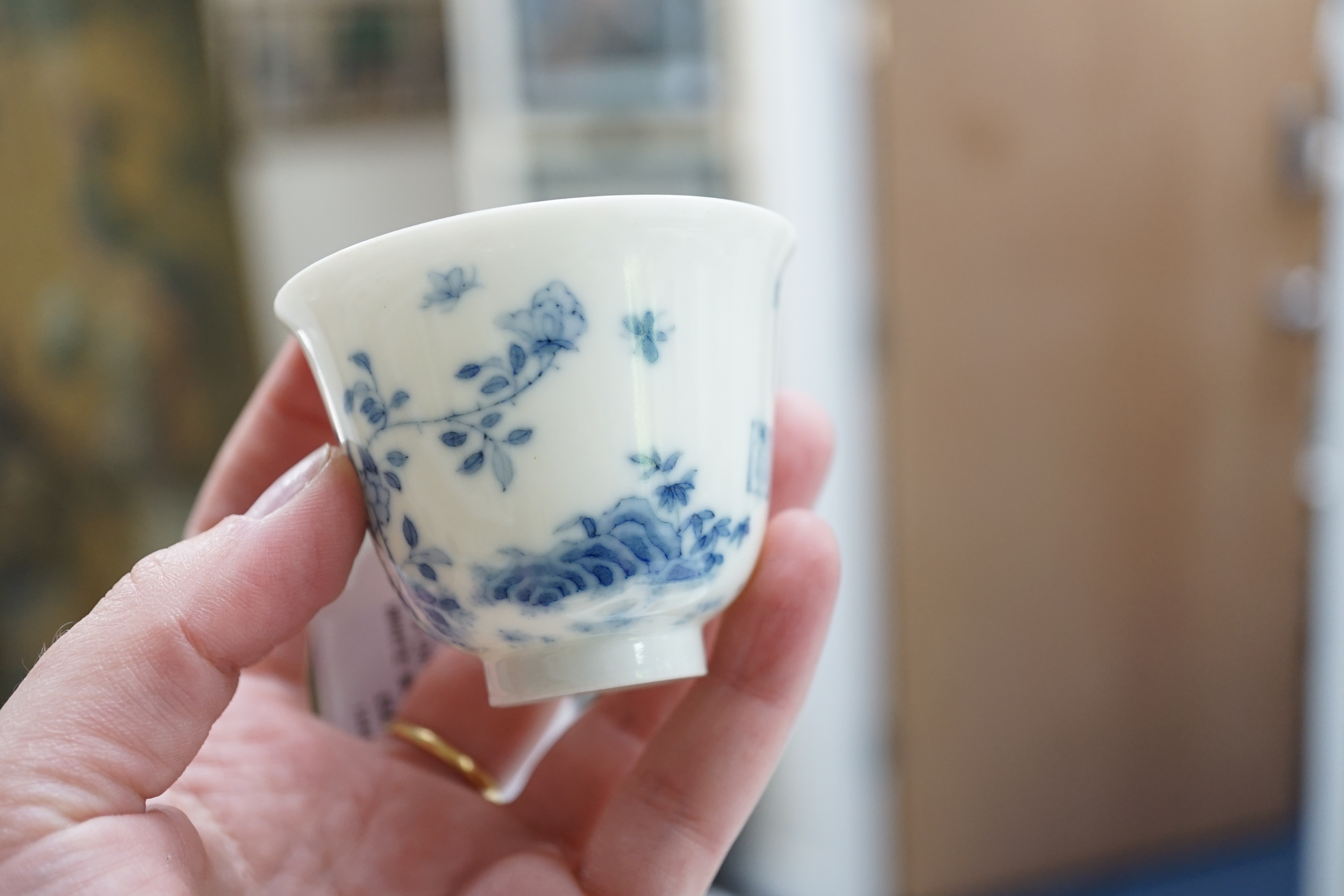 A Chinese blue and white 'month' cup, Kangxi mark, probably late 19th century